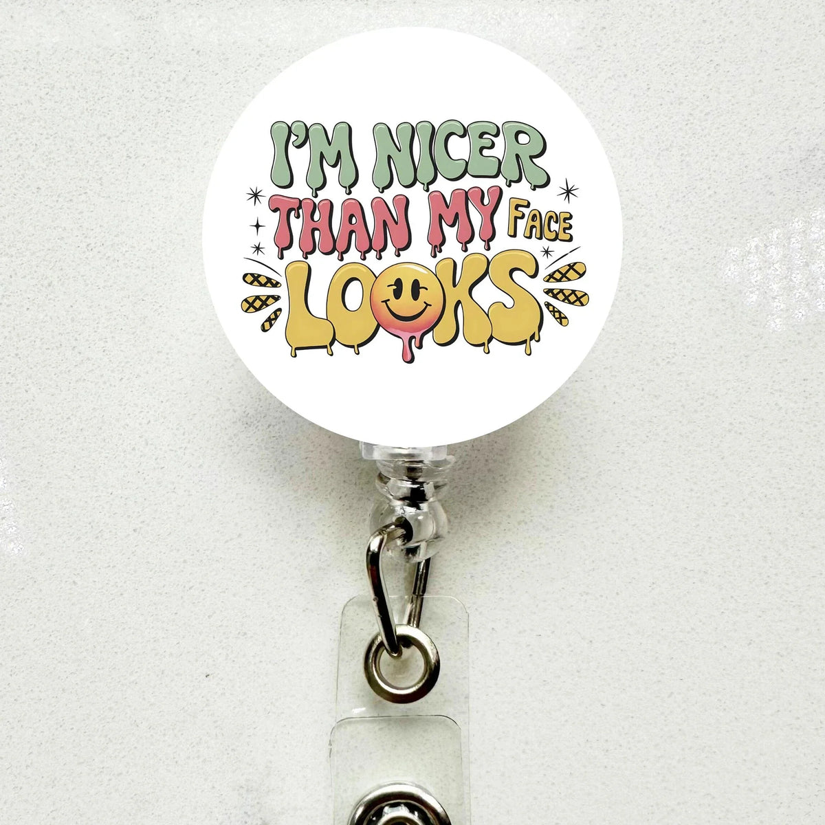 Funny 'I'm Nicer Than My Face Looks' Badge Reel