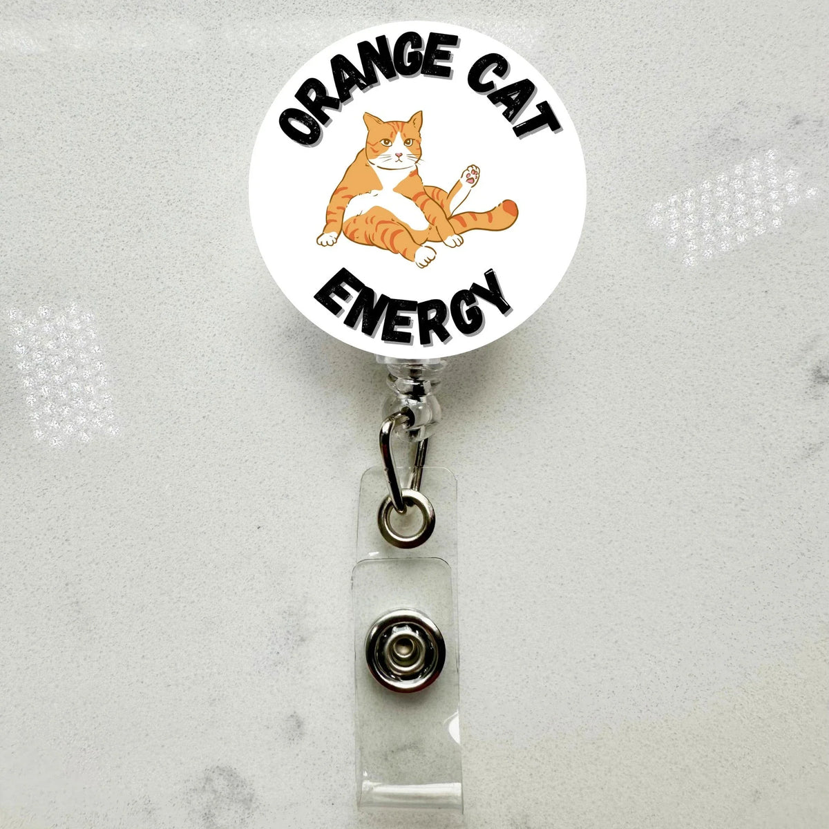 Orange Cat Energy Badge Reel