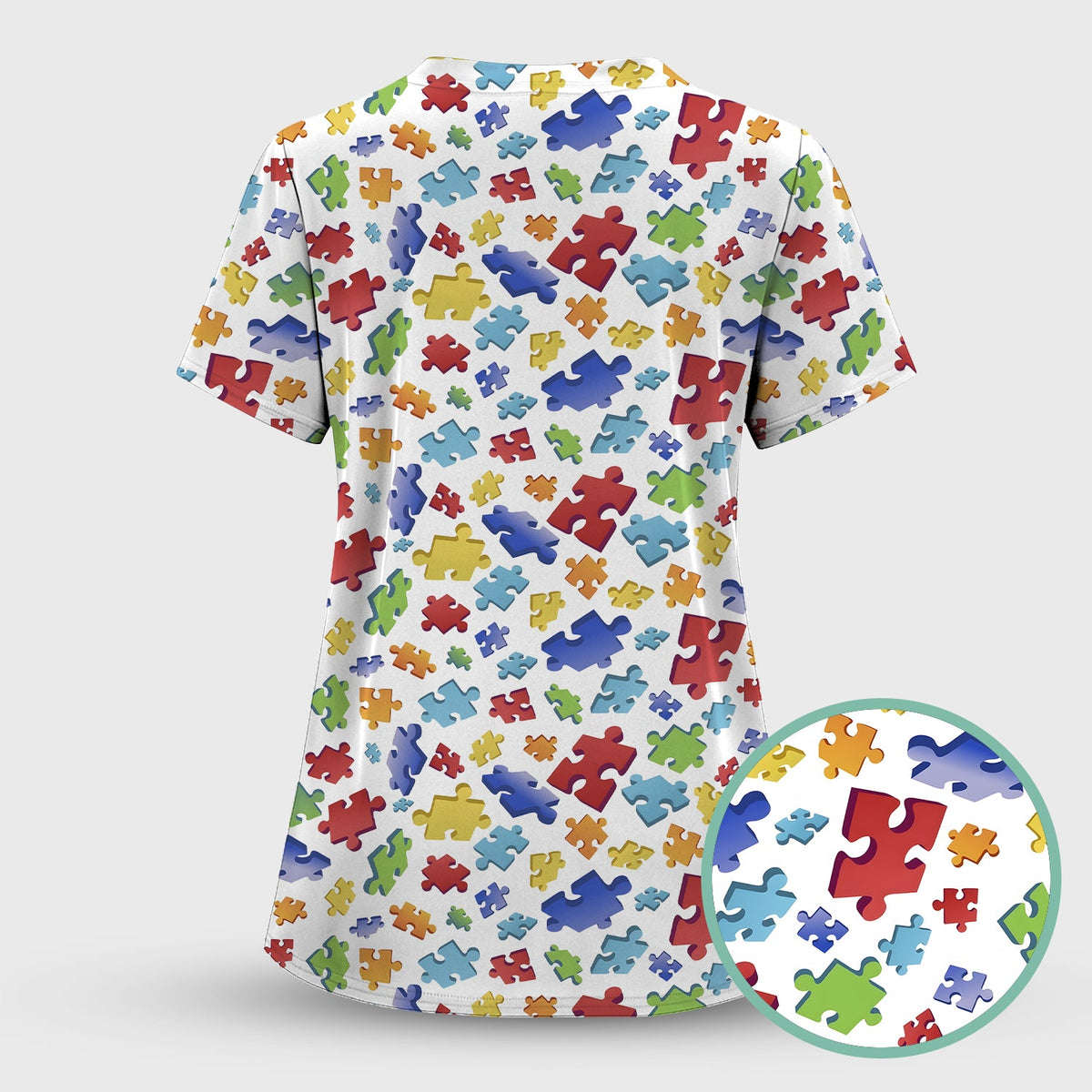 Colorful Scattered Puzzle Piece Nurse Scrub Top
