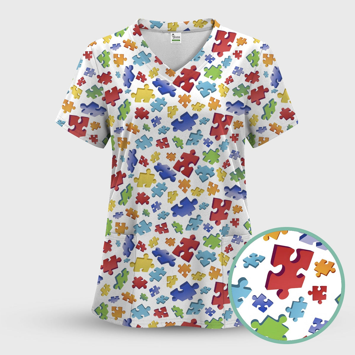 Colorful Scattered Puzzle Piece Nurse Scrub Top